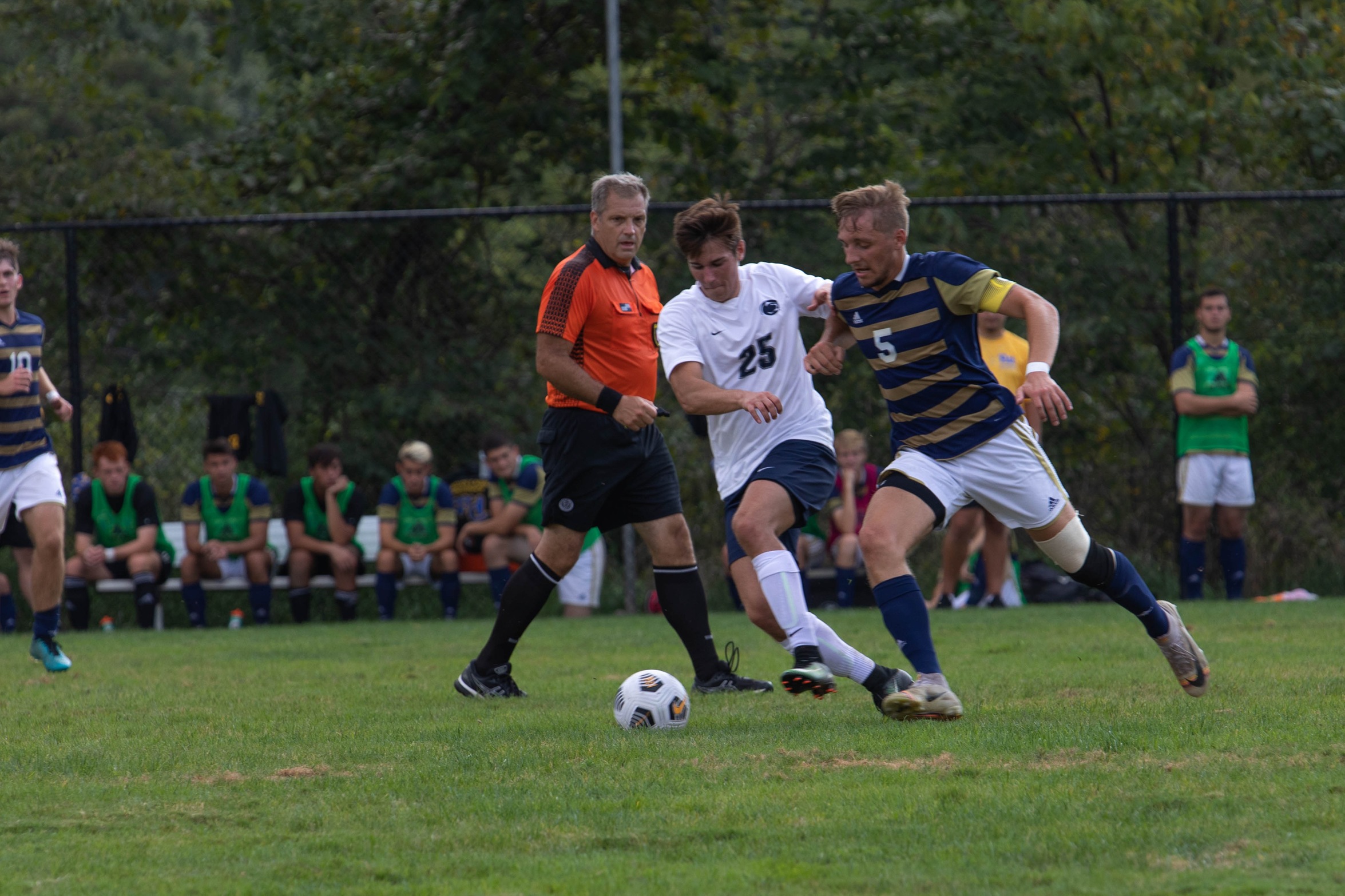 Vincent Gigliotti dribbles past a defender.